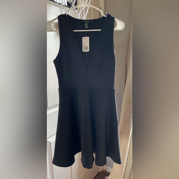 Forever 21 Dresses & Skirts - Super Cute Deep V Black Cocktail Dress